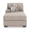 The appearance of Newellen Left-Arm Facing Corner Chaise In Hemp designed by Signature Design by Ashley in the modern / contemporary interior design. This hemp piece of furniture  was selected by 1StopBedrooms from Newellen Collection to add a touch of cosiness and style into your home. Sku: 4840416. Material: Fabric.