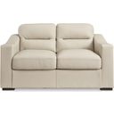 The appearance of Treasure Trove Loveseat In Almond designed by Signature Design by Ashley in the modern / contemporary interior design. This almond piece of furniture was selected by 1StopBedrooms from Treasure Trove Collection to add a touch of cosiness and style into your home. Sku: 1930435. Material: Genuine Leather.