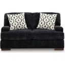 The appearance of Whitmore Manor Loveseat In Black Pearl designed by Signature Design by Ashley in the modern / contemporary interior design. This black pearl piece of furniture  was selected by 1StopBedrooms from Whitmore Manor Collection to add a touch of cosiness and style into your home. Sku: 8040435. Material: Fabric.