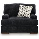 The appearance of Whitmore Manor Oversized Chair In Black Pearl designed by Signature Design by Ashley in the modern / contemporary interior design. This black pearl piece of furniture  was selected by 1StopBedrooms from Whitmore Manor Collection to add a touch of cosiness and style into your home. Sku: 8040423. Material: Fabric.