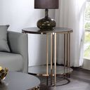 The appearance of Abisha End Table In Champagne designed by ACME in the modern / contemporary interior design. This champagne piece of furniture  was selected by 1StopBedrooms from Abisha Collection to add a touch of cosiness and style into your home. Sku: LV02816. Material: Metal.