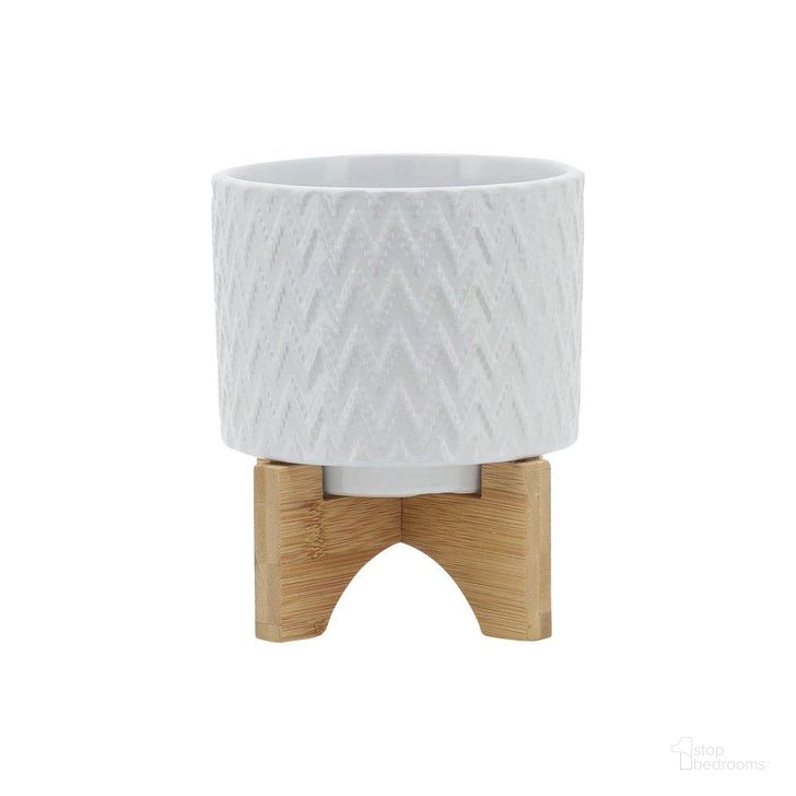 The appearance of 5 Inch Chevron Planter With Stand In White designed by Sagebrook in the modern / contemporary interior design. This white piece of furniture  was selected by 1StopBedrooms from  to add a touch of cosiness and style into your home. Sku: 15781-03. Material: Ceramic. Product Type: Outdoor Accessory. Image1