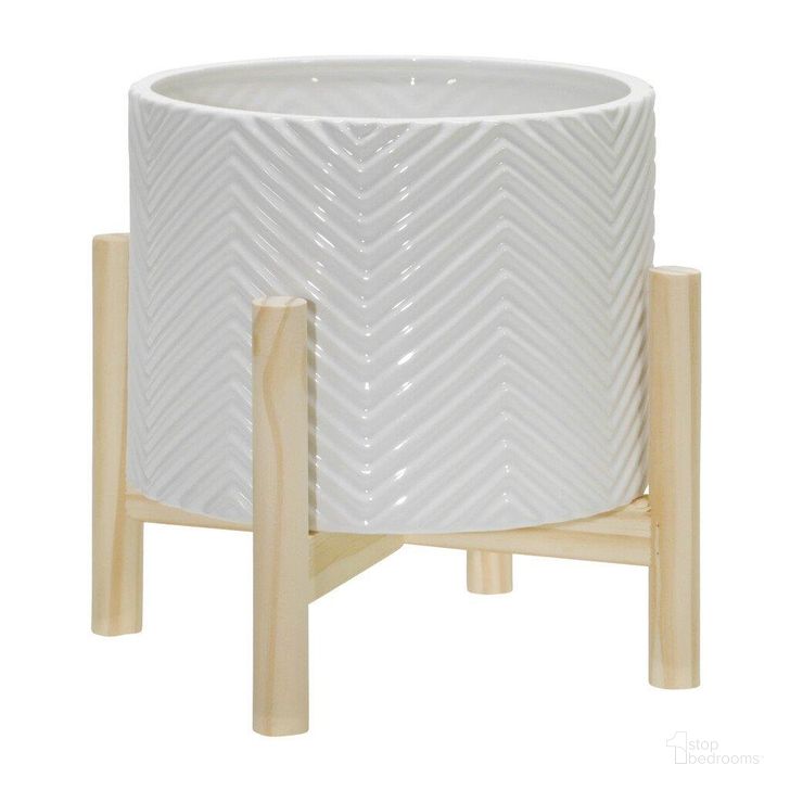 The appearance of 8 Inch Ceramic Chevron Planter With Wood Stand In White designed by Sagebrook in the modern / contemporary interior design. This white piece of furniture  was selected by 1StopBedrooms from  to add a touch of cosiness and style into your home. Sku: 15065-02. Material: Ceramic. Product Type: Outdoor Accessory. Image1