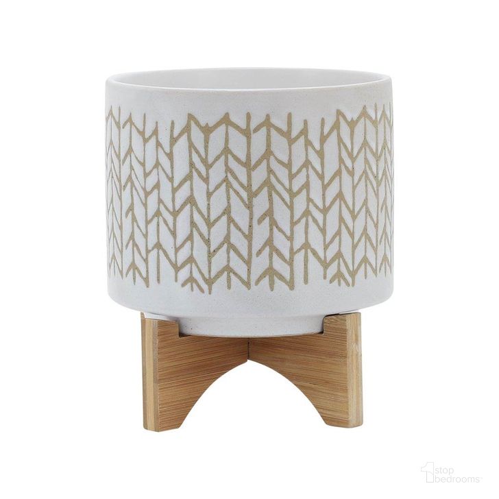 The appearance of 8 Inch Chevron Planter With Wood Stand In Beige designed by Sagebrook in the modern / contemporary interior design. This ivory and beige piece of furniture  was selected by 1StopBedrooms from  to add a touch of cosiness and style into your home. Sku: 15805-02. Material: Ceramic. Product Type: Outdoor Accessory. Image1