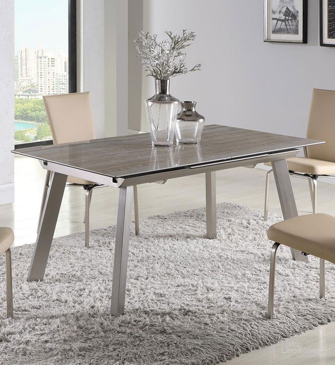The appearance of Eleanor Glass And Ceramic Table With Pop Up Extension In Beige designed by Chintaly Imports in the modern / contemporary interior design. This beige piece of furniture  was selected by 1StopBedrooms from Eleanor Collection to add a touch of cosiness and style into your home. Sku: ELEANOR-DT. Product Type: Dining Table. Size: 63". Image1