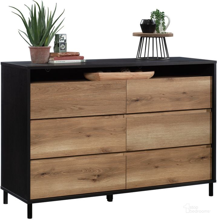 The appearance of Acadia Way Dresser In Raven Oak designed by Sauder in the modern / contemporary interior design. This raven oak piece of furniture  was selected by 1StopBedrooms from Acadia Way Collection to add a touch of cosiness and style into your home. Sku: 430442. Product Type: Dresser. Material: Engineered Wood. Image1