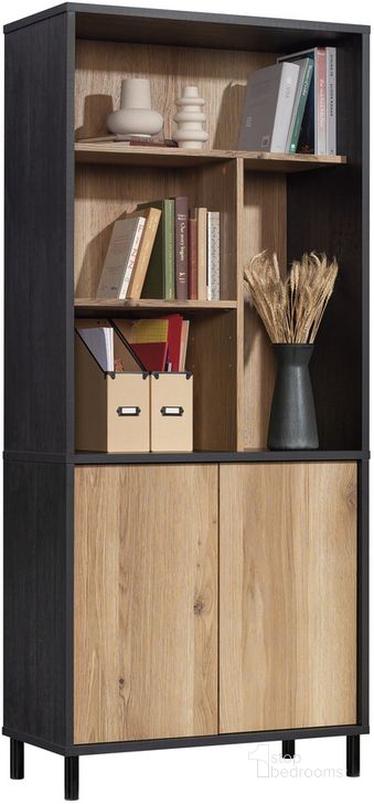 The appearance of Acadia Way Library With Doors In Raven Oak designed by Sauder in the modern / contemporary interior design. This raven oak piece of furniture  was selected by 1StopBedrooms from Acadia Way Collection to add a touch of cosiness and style into your home. Sku: 430754. Product Type: Bookcase. Material: Engineered Wood. Image1