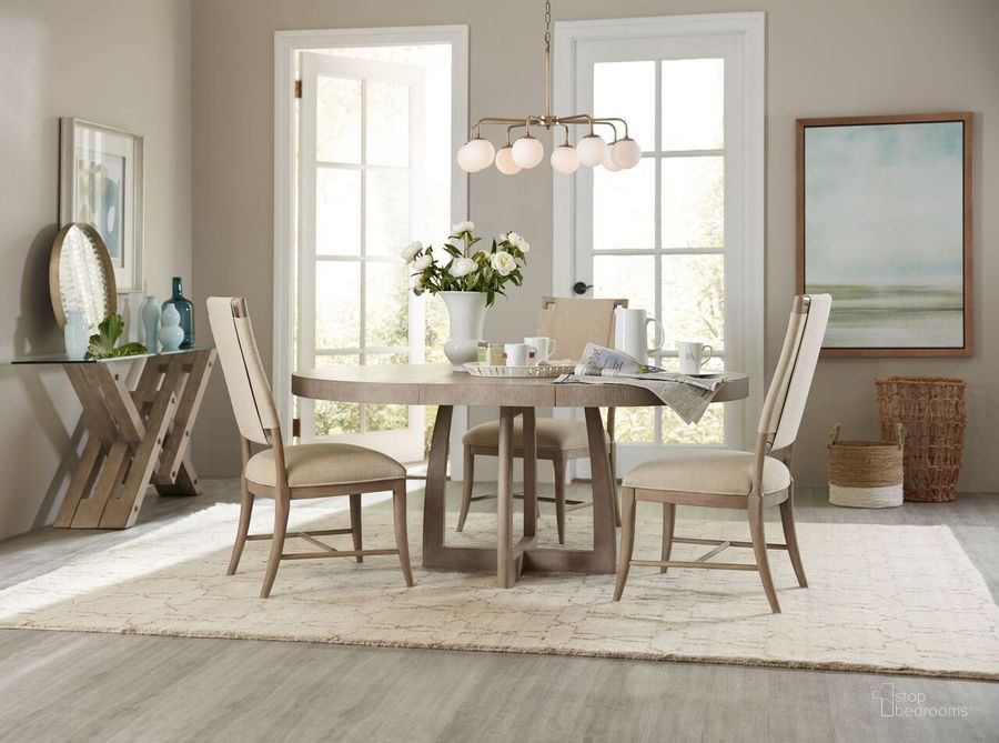 The appearance of Affinity Gray 48" Round Pedestal Extendable Dining Room Set designed by Hooker in the transitional interior design. This gray piece of furniture  was selected by 1StopBedrooms from Affinity Collection to add a touch of cosiness and style into your home. Sku: 6050-75203-GRY;6050-75500-GRY;6050-75500-GRY. Table Base Style: Trestle. Table Top Shape: Round. Material: Wood. Product Type: Dining Room Set. Image1