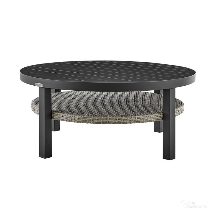 The appearance of Aileen Outdoor Patio Round Coffee Table In Black Aluminum with Gray Wicker Shelf designed by Armen Living in the modern / contemporary interior design. This black piece of furniture  was selected by 1StopBedrooms from Aileen Collection to add a touch of cosiness and style into your home. Sku: 840254332508. Material: Aluminum. Product Type: Outdoor Table. Image1