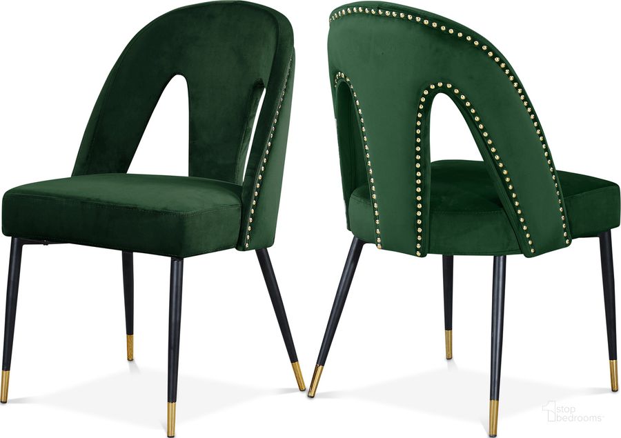 The appearance of Akoya Velvet Dining Chair Set of 2 In Green designed by Meridian in the modern / contemporary interior design. This green velvet piece of furniture  was selected by 1StopBedrooms from Akoya Collection to add a touch of cosiness and style into your home. Sku: 794Green-C. Material: Wood. Product Type: Dining Chair. Image1