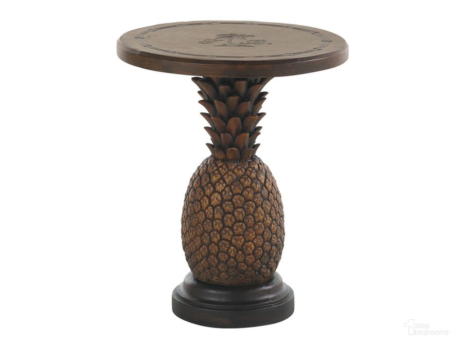 The appearance of Alfresco Living Light and Gold Sienna Pineapple Table designed by Tommy Bahama in the modern / contemporary interior design. This sienna piece of furniture  was selected by 1StopBedrooms from Alfresco Living Collection to add a touch of cosiness and style into your home. Sku: 01-3100-200. Material: Wood. Product Type: Outdoor Table. Image1