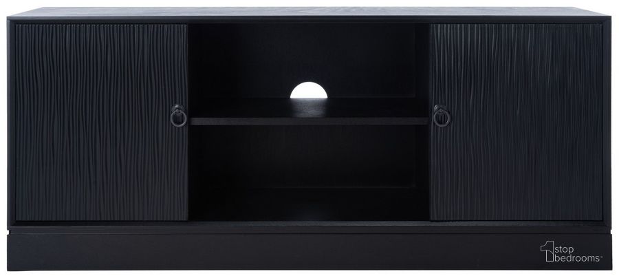 The appearance of Aliyah 2Dr 1 Shelf Media Stand in Black designed by Safavieh in the rustic / southwestern interior design. This black piece of furniture  was selected by 1StopBedrooms from Aliyah Collection to add a touch of cosiness and style into your home. Sku: MED5710A. Material: Wood. Product Type: Media Unit. Image1