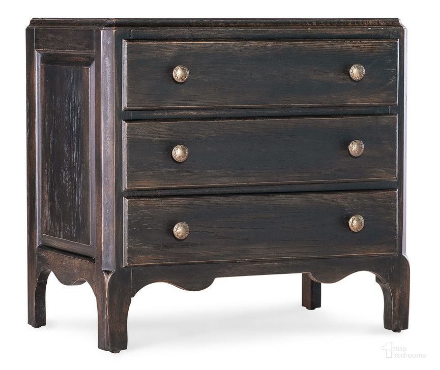 The appearance of Americana Three-Drawer Nightstand In Black designed by Hooker in the transitional interior design. This black piece of furniture  was selected by 1StopBedrooms from Americana Collection to add a touch of cosiness and style into your home. Sku: 7050-90015-89. Product Type: Nightstand. Material: Wood Veneer. Image1