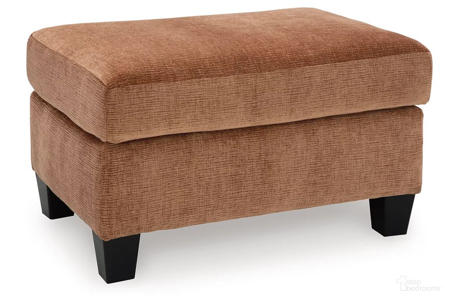 The appearance of Amity Bay Ottoman In Clay designed by Signature Design by Ashley in the modern / contemporary interior design. This clay piece of furniture  was selected by 1StopBedrooms from Amity Bay Collection to add a touch of cosiness and style into your home. Sku: 6720414. Material: Fabric. Product Type: Ottoman. Image1