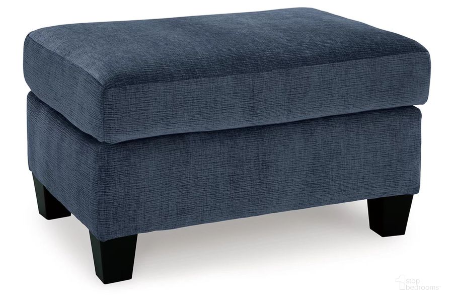 The appearance of Amity Bay Ottoman In Ink designed by Signature Design by Ashley in the modern / contemporary interior design. This ink piece of furniture  was selected by 1StopBedrooms from Amity Bay Collection to add a touch of cosiness and style into your home. Sku: 6720614. Material: Fabric. Product Type: Ottoman. Image1