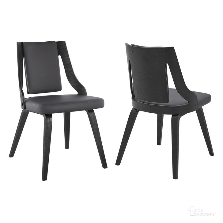 The appearance of Aniston Gray Faux Leather and Black Wood Dining Chair Set of 2 designed by Armen Living in the transitional interior design. This gray piece of furniture  was selected by 1StopBedrooms from Aniston Collection to add a touch of cosiness and style into your home. Sku: LCANSIBLGR. Material: Wood. Product Type: Dining Chair. Image1