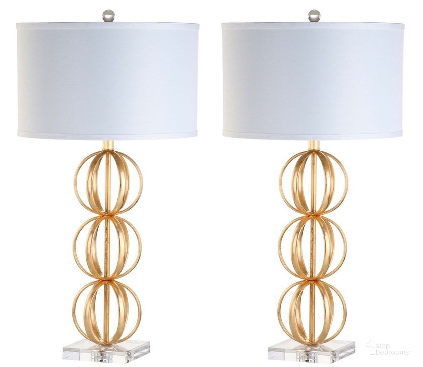 The appearance of Annistyn Brass Gold Table Lamp Set of 2 designed by Safavieh in the modern / contemporary interior design. This gold piece of furniture  was selected by 1StopBedrooms from Safavieh TBL Collection to add a touch of cosiness and style into your home. Sku: TBL4072A-SET2. Product Type: Table Lamp. Material: Brass. Image1