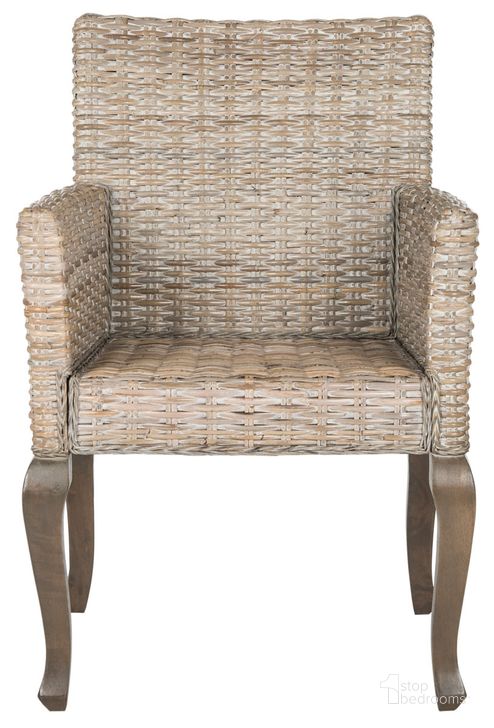 The appearance of Armando White Washed Wicker Dining Chair Set of 2 designed by Safavieh in the transitional interior design. This washed white piece of furniture  was selected by 1StopBedrooms from Armando Collection to add a touch of cosiness and style into your home. Sku: SEA8019B-SET2. Product Type: Dining Chair. Material: Rattan. Image1