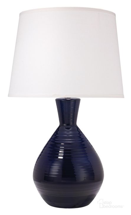 The appearance of Ash Navy Table Lamp designed by Jamie Young Company in the coastal interior design. This navy piece of furniture  was selected by 1StopBedrooms from Ash Collection to add a touch of cosiness and style into your home. Sku: 9ASHNVC131L. Material: Ceramic. Product Type: Table Lamp. Image1