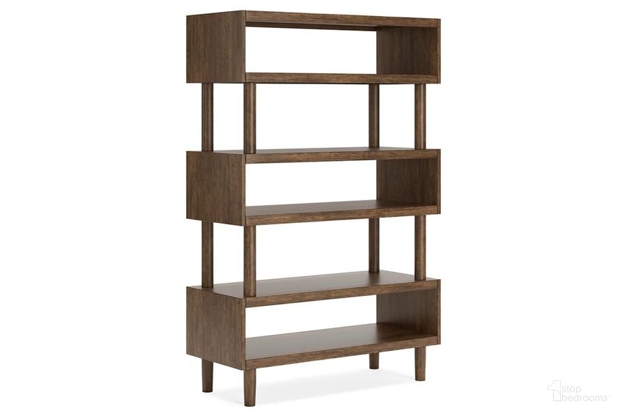 The appearance of Austanny 62 Inch Bookcase In Warm Brown designed by Signature Design by Ashley in the modern / contemporary interior design. This warm brown piece of furniture  was selected by 1StopBedrooms from Austanny Collection to add a touch of cosiness and style into your home. Sku: H683-17. Material: Wood. Product Type: Bookcase. Image1