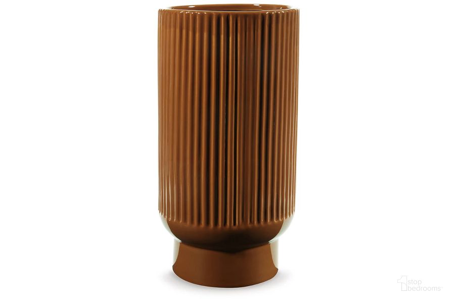 The appearance of Avalyah Vase In Burnt Umber designed by Signature Design by Ashley in the transitional interior design. This burnt umber piece of furniture  was selected by 1StopBedrooms from Avalyah Collection to add a touch of cosiness and style into your home. Sku: A2900022V. Material: Ceramic. Product Type: Vase. Image1