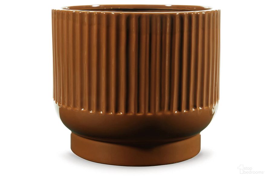 The appearance of Avalyah Vase In Burnt Umber designed by Signature Design by Ashley in the transitional interior design. This burnt umber piece of furniture  was selected by 1StopBedrooms from Avalyah Collection to add a touch of cosiness and style into your home. Sku: A2900021V. Material: Ceramic. Product Type: Vase. Image1