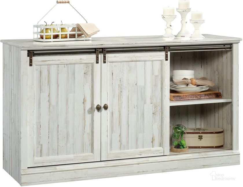 The appearance of Barrister Lane Credenza In White Plank designed by Sauder in the country / farmhouse interior design. This white plank piece of furniture  was selected by 1StopBedrooms from Barrister Lane Collection to add a touch of cosiness and style into your home. Sku: 423674. Product Type: Credenza. Material: Engineered Wood. Image1