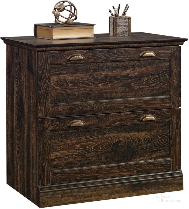 The appearance of Barrister Lane Lateral File In Iron Oak designed by Sauder in the traditional interior design. This iron oak piece of furniture  was selected by 1StopBedrooms from Barrister Lane Collection to add a touch of cosiness and style into your home. Sku: 431067. Product Type: File Cabinet. Material: Engineered Wood. Image1