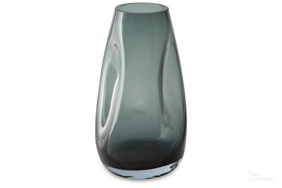 The appearance of Beamund Vase In Teal Blue designed by Signature Design by Ashley in the modern / contemporary interior design. This teal blue piece of furniture  was selected by 1StopBedrooms from Beamund Collection to add a touch of cosiness and style into your home. Sku: A2900010V. Material: Glass. Product Type: Vase. Image1