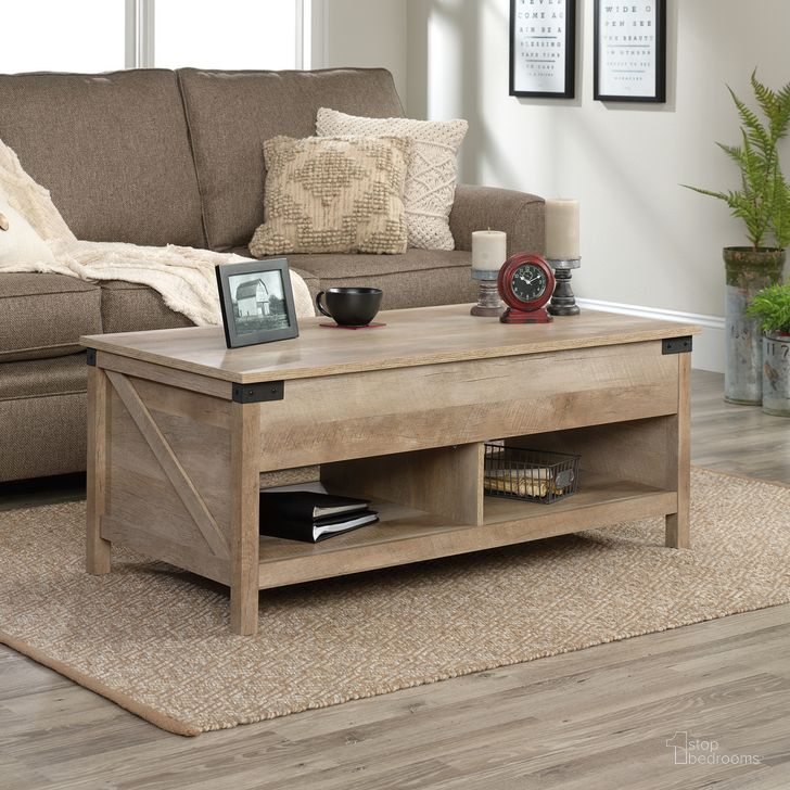 The appearance of Bridge Acre Lift-Top Coffee Table In Lintel Oak designed by Sauder in the country / farmhouse interior design. This lintel oak piece of furniture  was selected by 1StopBedrooms from Bridge Acre Collection to add a touch of cosiness and style into your home. Sku: 427692. Product Type: Coffee Table. Material: Engineered Wood. Image1
