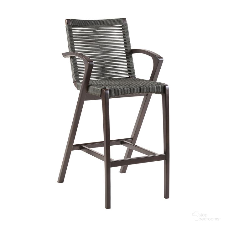 The appearance of Brielle Armed Outdoor UV Protected Dark Eucalyptus Wood and Grey Rope Counter Height Stool with Footrest designed by Armen Living in the modern / contemporary interior design. This gray piece of furniture  was selected by 1StopBedrooms from Brielle Collection to add a touch of cosiness and style into your home. Sku: LCBLBAGR26. Product Type: Outdoor Bar Furniture. Material: Rope. Image1