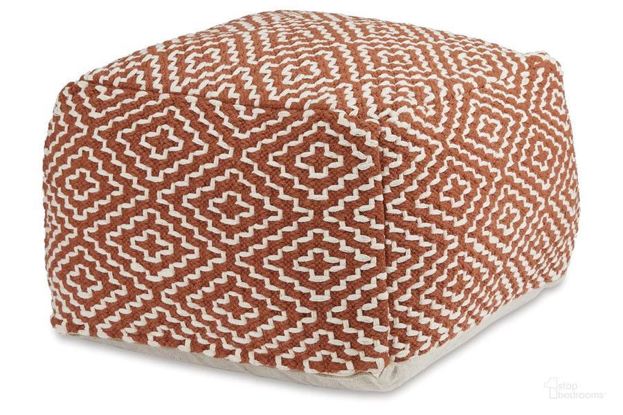 The appearance of Brynnsen Pouf In Ivory and Rust designed by Signature Design by Ashley in the transitional interior design. This ivory and rust piece of furniture  was selected by 1StopBedrooms from Brynnsen Collection to add a touch of cosiness and style into your home. Sku: A1001056. Product Type: Ottoman. Image1