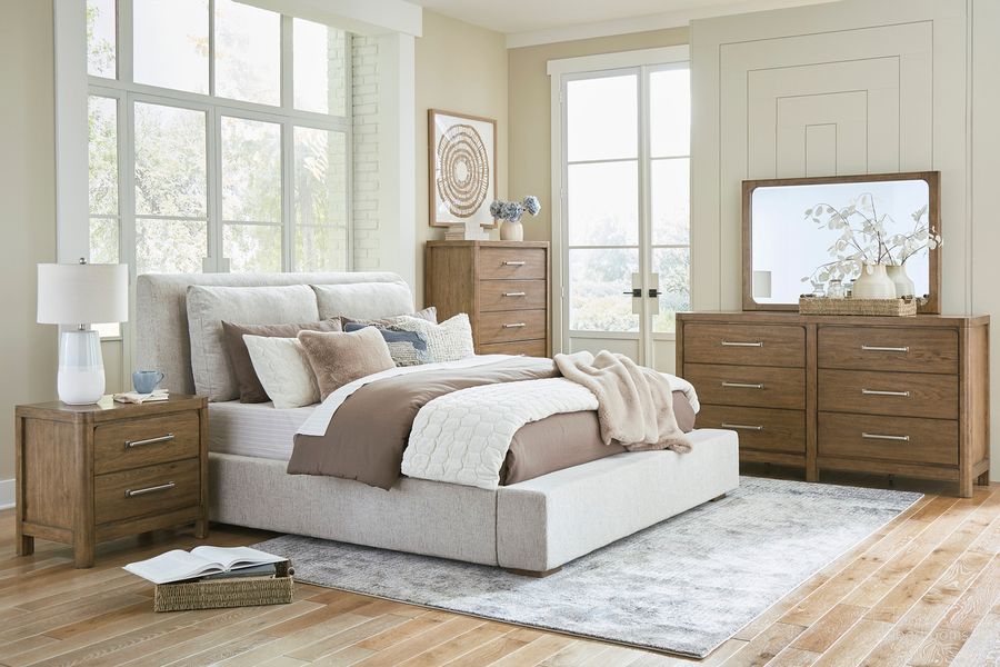 The appearance of Cabalynn Light Brown Upholstered Panel Bedroom Set designed by Signature Design by Ashley in the transitional interior design. This brown piece of furniture  was selected by 1StopBedrooms from Cabalynn Collection to add a touch of cosiness and style into your home. Sku: B974-74;B974-77;B974-92. Material: Fabric. Product Type: Panel Bed. Bed Size: Queen. Image1