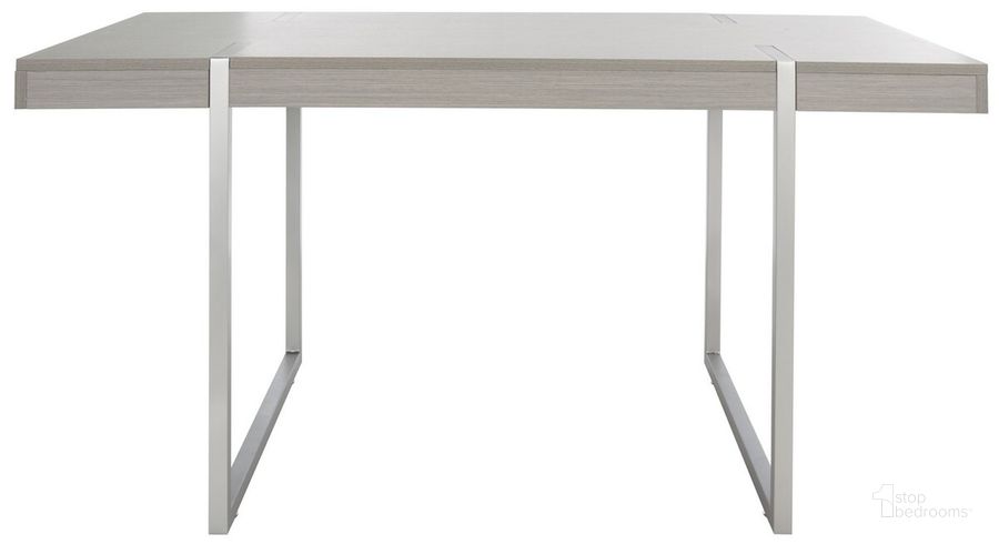 The appearance of Cael Dining Table in Grey and Silver designed by Safavieh in the modern / contemporary interior design. This grey and silver piece of furniture  was selected by 1StopBedrooms from Cael Collection to add a touch of cosiness and style into your home. Sku: DTB9300D. Table Base Style: Double Pedestal. Material: Wood. Product Type: Dining Table. Table Top Shape: Rectangular. Size: 59". Image1