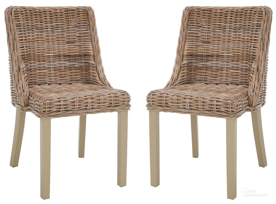 The appearance of Caprice Natural Wicker Dining Chair with Leather Handle Set of 2 designed by Safavieh in the traditional interior design. This grey piece of furniture  was selected by 1StopBedrooms from Safavieh SEA Collection to add a touch of cosiness and style into your home. Sku: SEA7005A-SET2. Product Type: Dining Chair. Material: Rattan. Image1