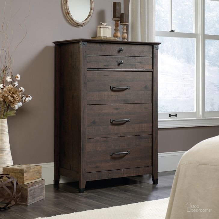 The appearance of Carson Forge 4-Drawer Chest In Coffee Oak designed by Sauder in the country / farmhouse interior design. This coffee oak piece of furniture  was selected by 1StopBedrooms from Carson Forge Collection to add a touch of cosiness and style into your home. Sku: 419081. Product Type: Chest. Material: Engineered Wood. Image1