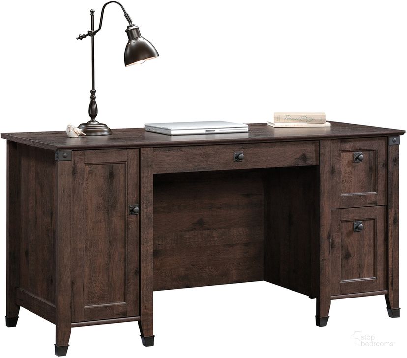 The appearance of Carson Forge Computer Desk In Coffee Oak designed by Sauder in the country / farmhouse interior design. This coffee oak piece of furniture  was selected by 1StopBedrooms from Carson Forge Collection to add a touch of cosiness and style into your home. Sku: 422350. Product Type: Computer Desk. Material: Engineered Wood. Image1