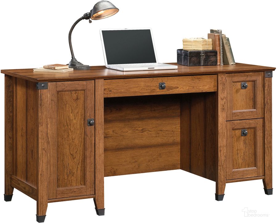 The appearance of Carson Forge Computer Desk In Washington Cherry designed by Sauder in the country / farmhouse interior design. This washington cherry piece of furniture  was selected by 1StopBedrooms from Carson Forge Collection to add a touch of cosiness and style into your home. Sku: 422032. Product Type: Computer Desk. Material: Engineered Wood. Image1