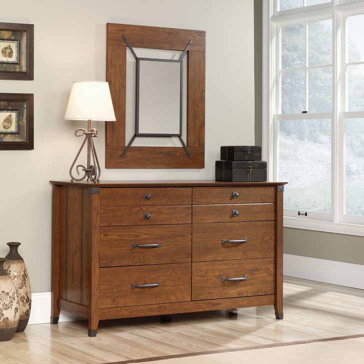 The appearance of Carson Forge Dresser In Washington Cherry designed by Sauder in the country / farmhouse interior design. This washington cherry piece of furniture  was selected by 1StopBedrooms from Carson Forge Collection to add a touch of cosiness and style into your home. Sku: 415520. Product Type: Dresser. Material: Engineered Wood. Image1