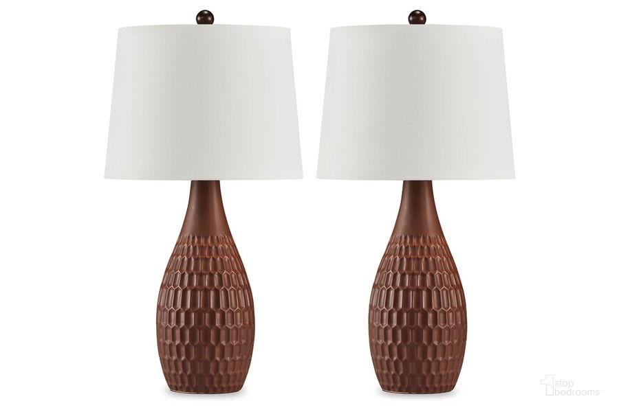 The appearance of Cartford Table Lamp Set of 2 In Brown designed by Signature Design by Ashley in the transitional interior design. This brown piece of furniture  was selected by 1StopBedrooms from Cartford Collection to add a touch of cosiness and style into your home. Sku: L178004. Material: Ceramic. Product Type: Table Lamp. Image1