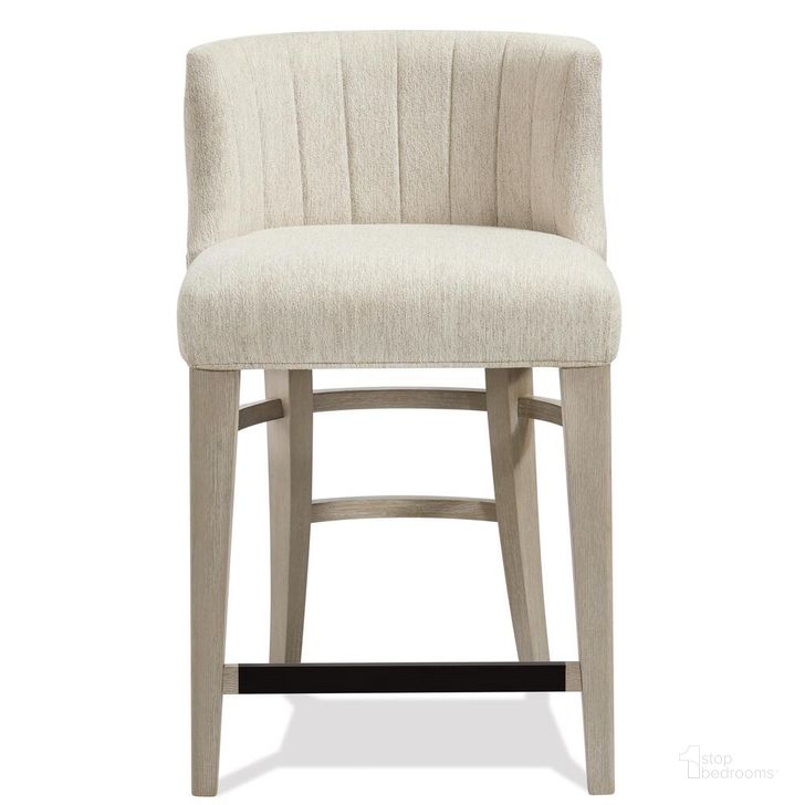 The appearance of Cascade Upholstered Curved Back Counter Stool Set of 2 In Dovetail designed by Riverside Furniture in the modern / contemporary interior design. This dovetail piece of furniture  was selected by 1StopBedrooms from Cascade Collection to add a touch of cosiness and style into your home. Sku: 73455. Product Type: Barstool. Image1