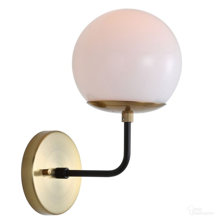 The appearance of Cayden Brass Gold and Black Wall Sconce designed by Safavieh in the modern / contemporary interior design. This gold piece of furniture  was selected by 1StopBedrooms from Safavieh SCN Collection to add a touch of cosiness and style into your home. Sku: SCN4017A. Product Type: Wall Sconce. Material: Brass. Image1