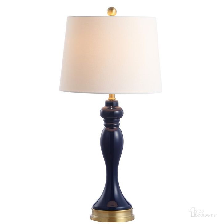 The appearance of Cayson 28 Inch Navy Glass and Iron Table Lamp with Usb Port designed by Safavieh in the traditional interior design. This navy/gold piece of furniture  was selected by 1StopBedrooms from Cayson Collection to add a touch of cosiness and style into your home. Sku: TBL4203A-U. Material: Glass. Product Type: Table Lamp. Image1