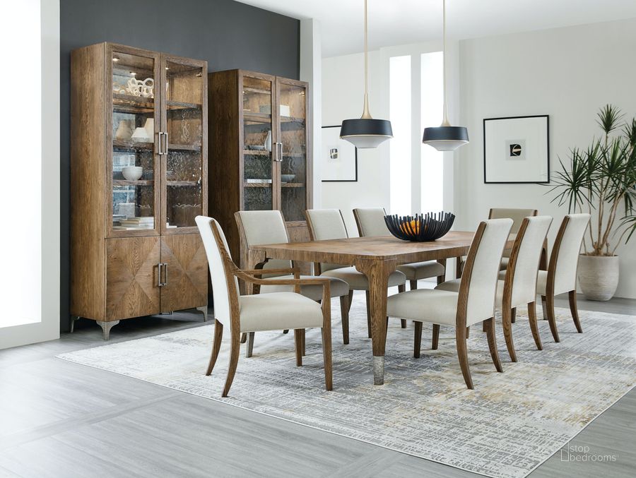 The appearance of Chapman Brown Extendable Dining Room Set designed by Hooker in the modern / contemporary interior design. This brown piece of furniture  was selected by 1StopBedrooms from Chapman Collection to add a touch of cosiness and style into your home. Sku: 6033-75200-85;6033-75410-85. Product Type: Dining Room Set. Material: Wood Veneer. Image1