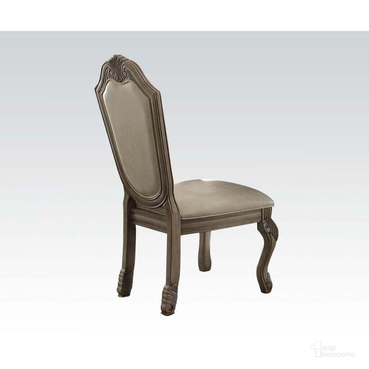 The appearance of Chateau De Ville Side Chair Set of 2 In Synthetic Leather and Antique White designed by ACME in the transitional interior design. This antique white piece of furniture  was selected by 1StopBedrooms from Chateau De Ville Collection to add a touch of cosiness and style into your home. Sku: 64067A. Material: Wood. Product Type: Side Chair. Image1