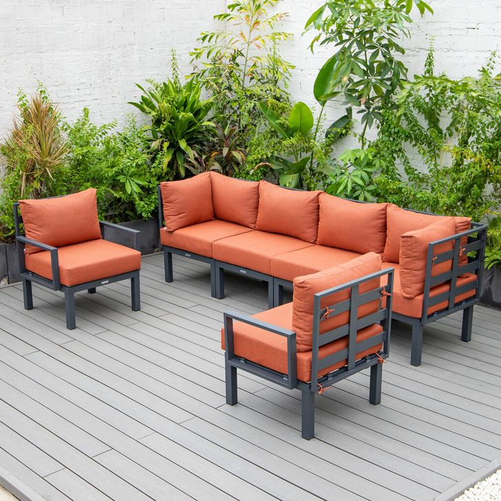 The appearance of Chelsea 6 Piece Patio Sectional with Cushions In Orange designed by LeisureMod in the transitional interior design. This orange piece of furniture  was selected by 1StopBedrooms from Chelsea Collection to add a touch of cosiness and style into your home. Sku: CSBL-6OR. Material: Aluminum. Product Type: Outdoor Sectional. Image1