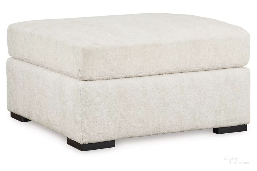 The appearance of Chessington Oversized Accent Ottoman In Ivory designed by Signature Design by Ashley in the modern / contemporary interior design. This ivory piece of furniture  was selected by 1StopBedrooms from Chessington Collection to add a touch of cosiness and style into your home. Sku: 6190408. Material: Fabric. Product Type: Ottoman. Image1