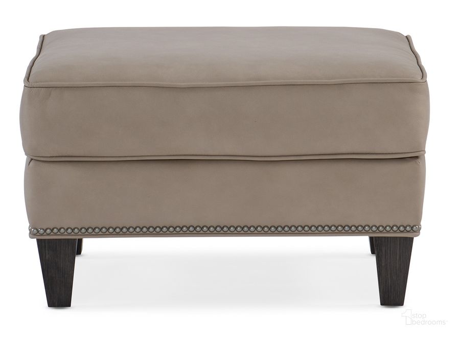 The appearance of Christopher Ottoman In Beige designed by Hooker in the transitional interior design. This beige piece of furniture  was selected by 1StopBedrooms from Christopher Collection to add a touch of cosiness and style into your home. Sku: BYX-318-OT-980013-82STPN. Material: Leather. Product Type: Ottoman. Image1