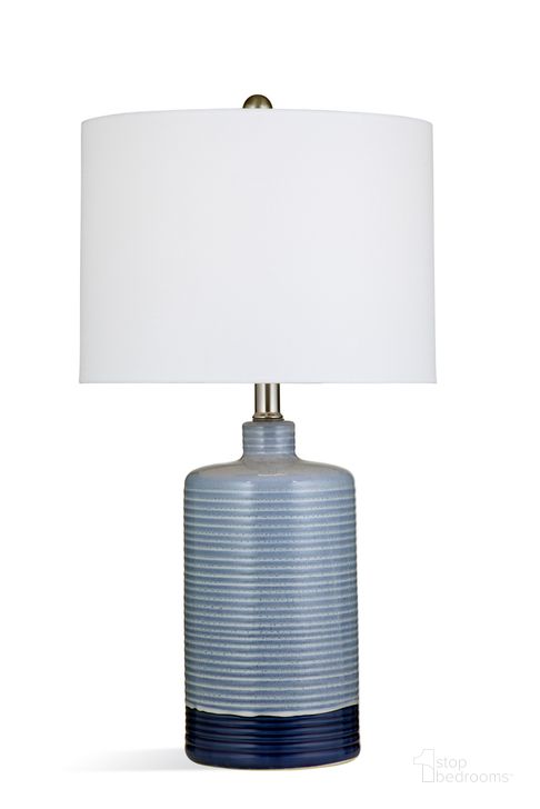 The appearance of Classe Table Lamp In Shiny Blue and Navy designed by Bassett Mirror Company in the traditional interior design. This navy piece of furniture  was selected by 1StopBedrooms from  to add a touch of cosiness and style into your home. Sku: L4231T. Material: Ceramic. Product Type: Table Lamp. Image1