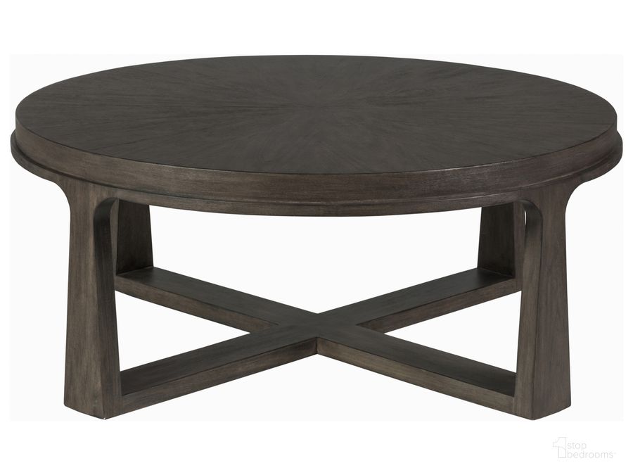 The appearance of Cohesion Program Rousseau Round Cocktail Table 01-2228-943-39 designed by Artistica Home in the modern / contemporary interior design. This medium brown piece of furniture  was selected by 1StopBedrooms from Cohesion Program Collection to add a touch of cosiness and style into your home. Sku: 01-2228-943-39. Product Type: Cocktail Table. Image1